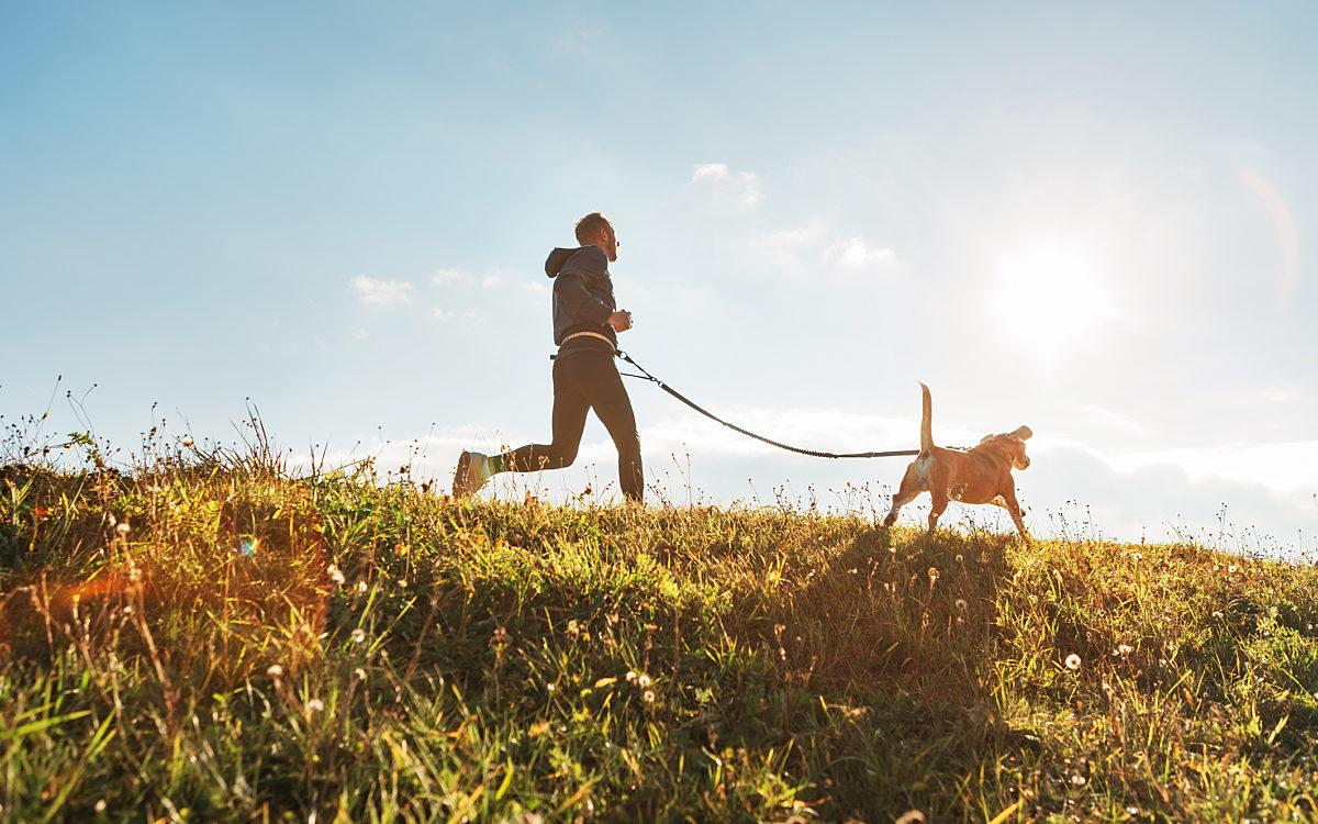 Man Running with Dog